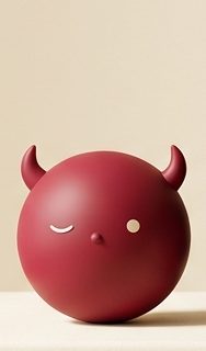 Red round devil figurine